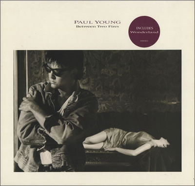 Paul Young ‎– Between Two Fires